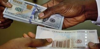 Naira stable against dollar at official window, trades at N1,476/$1
