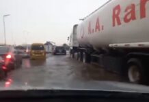 Motorists, commuters stranded as flood submerges Lagos-Ibadan long bridge (Video)