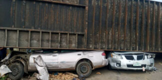 Eight children escape death as container falls on 2 cars in Kogi